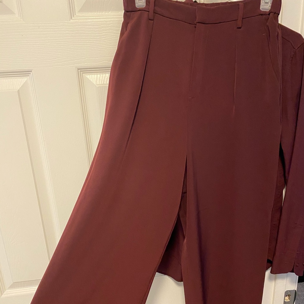 Burgundy wide leg trouser.